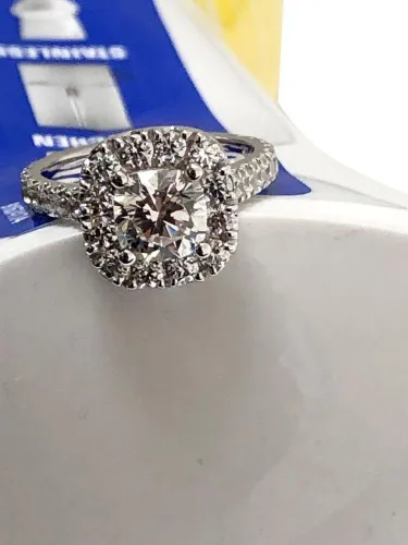Twist Round Cut Moissanite Engagement Ring