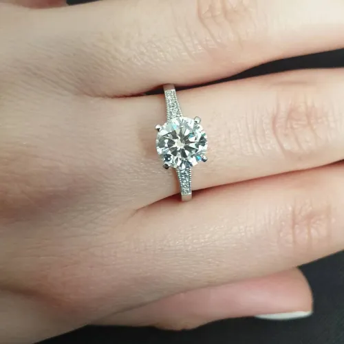 Twist Round Cut Moissanite Engagement Ring