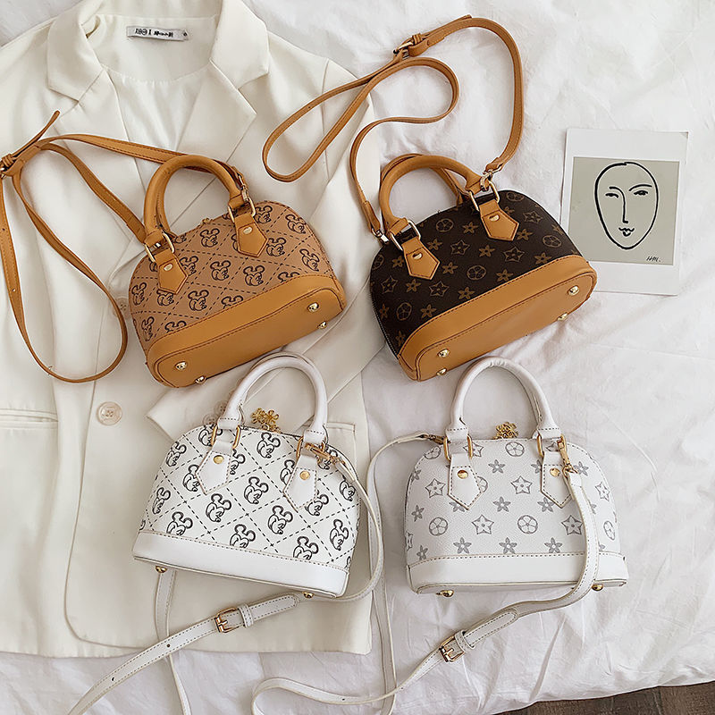 時尚貝殼老花包 印花手提包 斜掛包