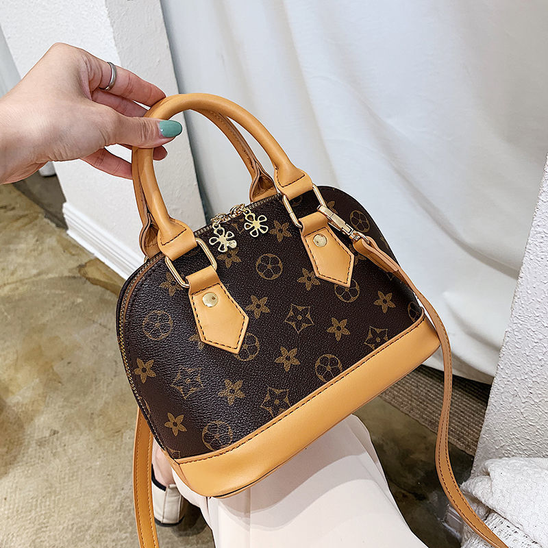 時尚貝殼老花包 印花手提包 斜掛包