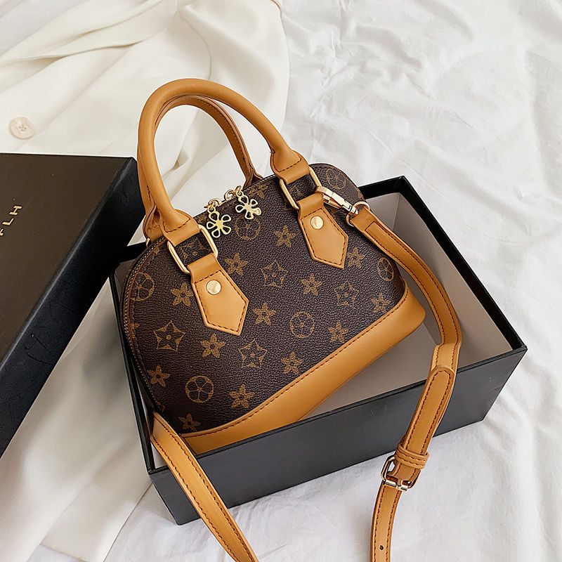 時尚貝殼老花包 印花手提包 斜掛包