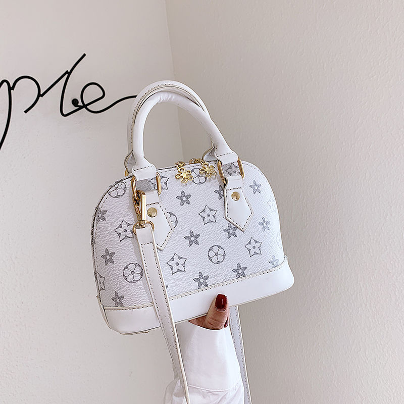 時尚貝殼老花包 印花手提包 斜掛包