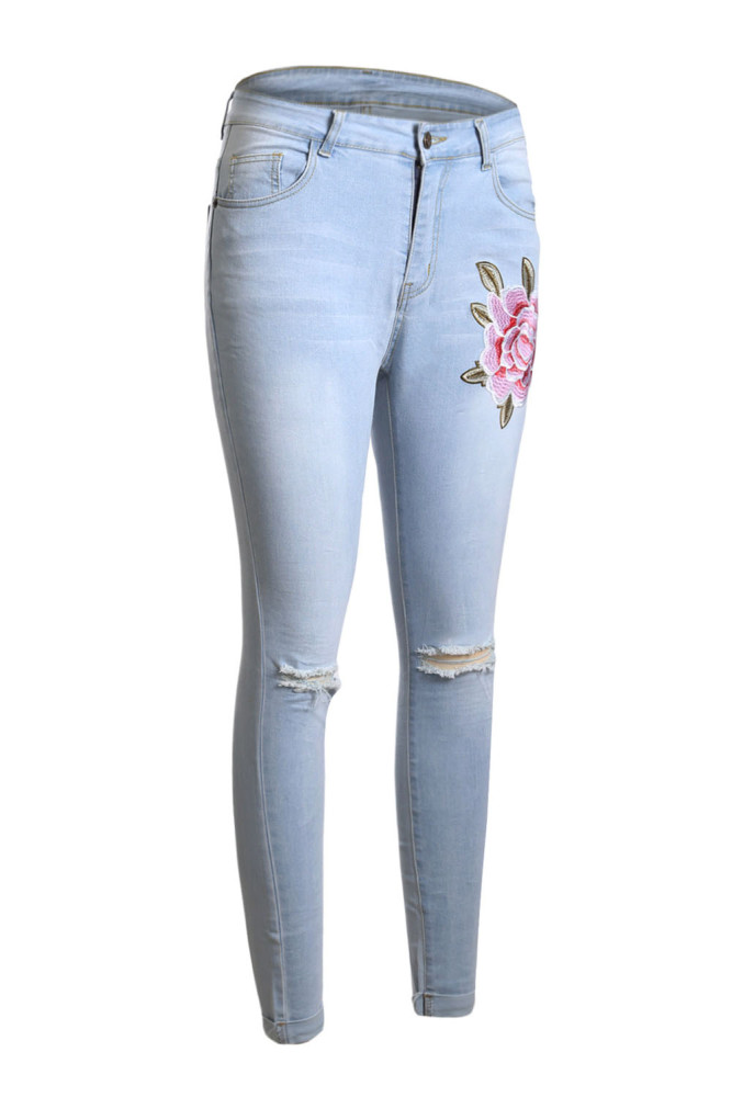 Rose Embroidered Knee Distress Light Wash Skinny Jeans