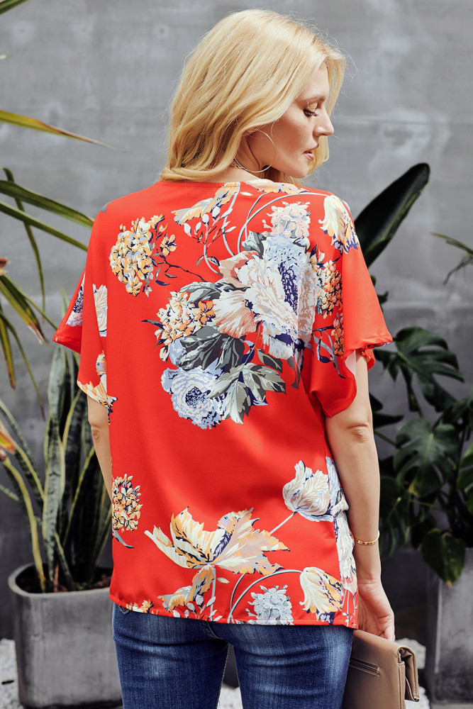 Orange Amaryllis Floral Twist Top