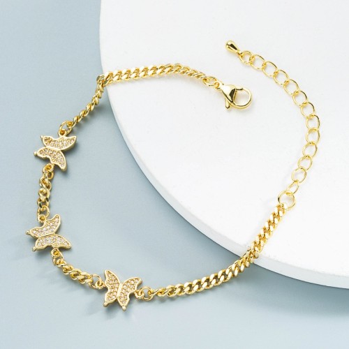 Joyería al por mayor, cadena de mariposa simple, pulsera de circón con incrustaciones de oro laminado