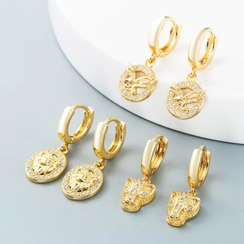joyería al por mayor simple hueco león rey cabeza de leopardo águila pendientes de oro laminado