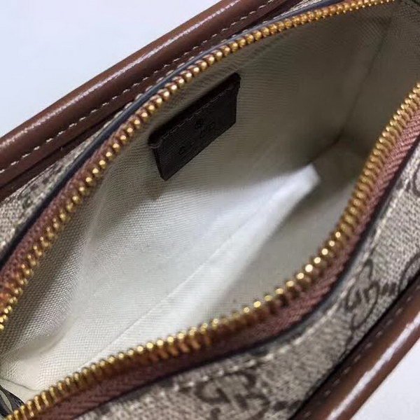 【原版皮】古驰/Gucci 印花手拿包，经典GG Supreme高级人造帆布匠心制成，点缀Fake和Not词语印花，在品牌标志性元素中注入诙谐意味，款号：636243
